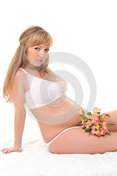 pregnant woman isolated over a white background