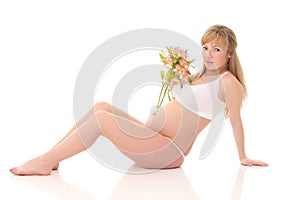 pregnant woman isolated over a white background