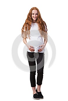 The pregnant woman isolated on the white