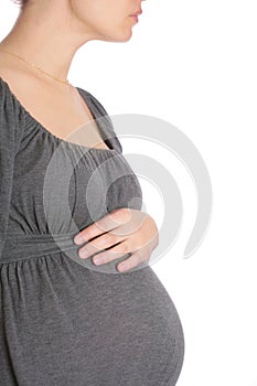 Pregnant woman in knitted dress