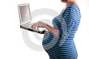 Pregnant woman and laptop