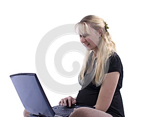 Pregnant woman with laptop