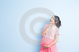 Pregnant woman look somewhere