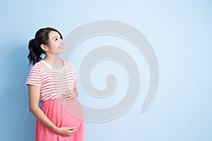 Pregnant woman look somewhere