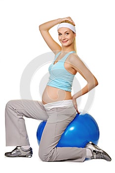 Pregnant woman making exercise