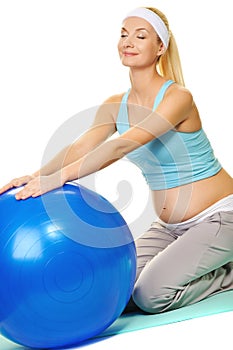 Pregnant woman making exercise