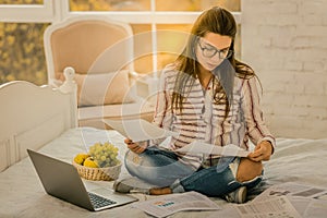 Pregnant woman managing the working process from home
