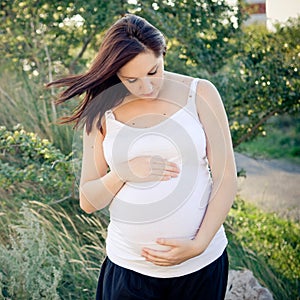 Pregnant woman in nature