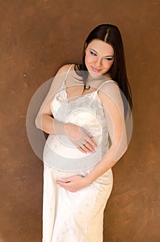 pregnant woman in a negligee dress