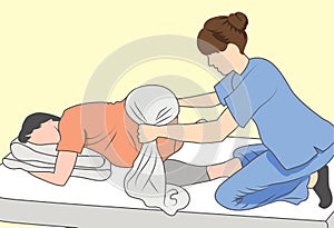 Pregnant woman with nurse supporting baby & mother with towel