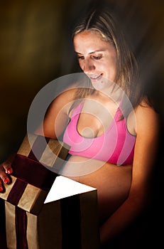 Pregnant Woman Opens Gift Box Christmas Present