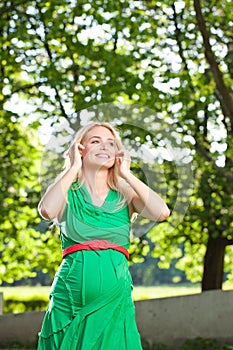 Pregnant Woman In The Park