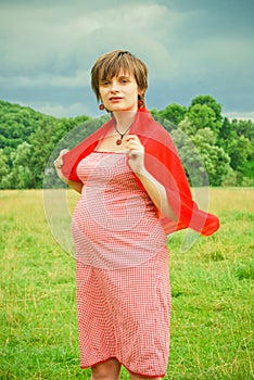 Pregnant Woman playing with ballons
