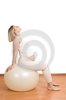 Pregnant woman practicing physical exercise