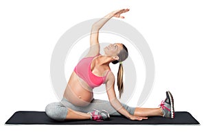 Pregnant woman practicing yoga