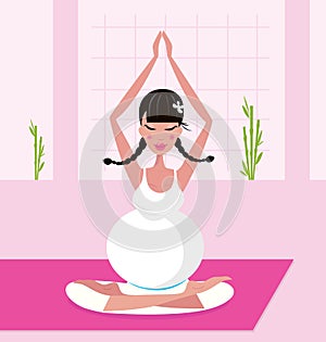 Pregnant woman practicing yoga asana