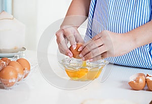 Pregnant woman preparing meal at table in the kitchen,healthy nu