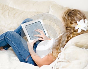 Pregnant woman reading ebook