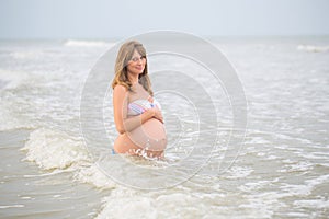 Pregnant woman ready for swim