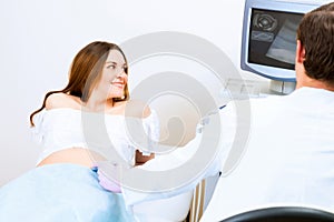 Pregnant woman on reception at the doctor