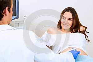 Pregnant woman on reception at the doctor