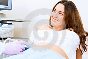 Pregnant woman on reception at the doctor