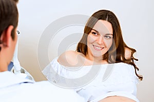 Pregnant woman on reception at the doctor