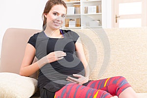 Pregnant woman resting at home