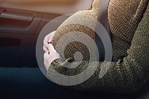 Pregnant woman with seat belt