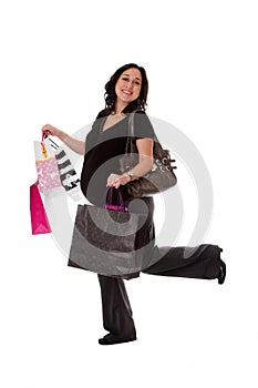 Pregnant woman with shopping bags