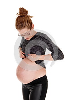 Pregnant woman showing bally.