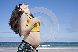 Pregnant woman showing paunch photo