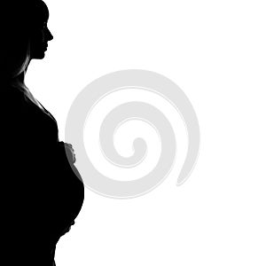 Pregnant woman silhouette with copy space