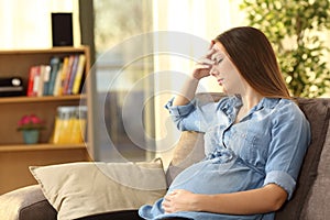 Pregnant woman suffering headache