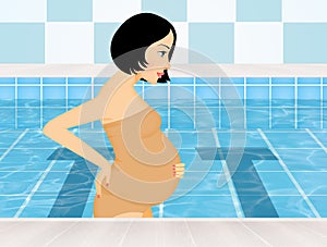 Pregnant woman in the swimming pool