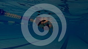 pregnant woman swimming in the pool