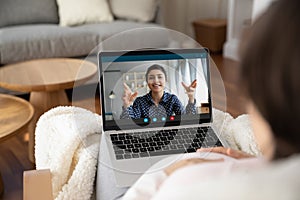Pregnant woman talk on virtual video call on computer