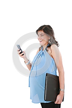 A pregnant woman texting