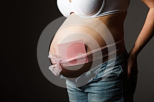 Pregnant woman torso