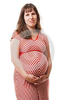 Pregnant woman touching or bonding her abdomen