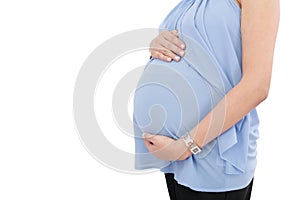 Pregnant woman touching her belly