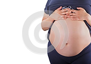 Pregnant woman touching her belly