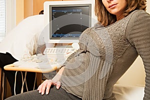 Pregnant woman in ultrasound examination