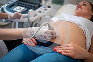 Pregnant woman on utltrasonographic examination at hospital