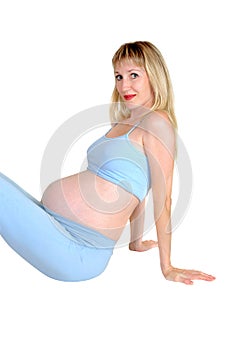 The pregnant woman on a white background