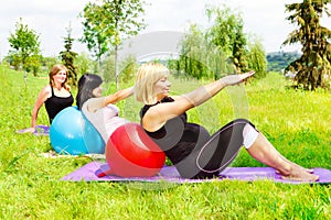 Pregnant women doing aerobics