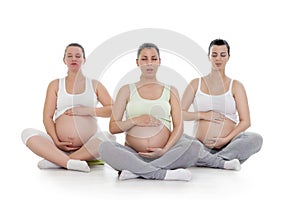 Pregnant women doing breathing exercise