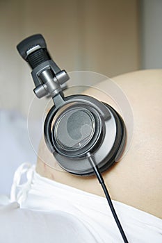 Pregnant women listen music
