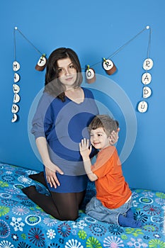 Pregnant women and little boy