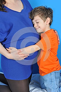 Pregnant women and little boy